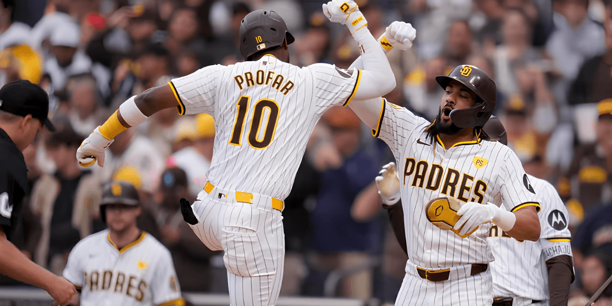 Two San Diego Padres players celebrate a home run during a game